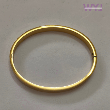 Minimalist Geometric Engraved Gold-Tone Bangle - Image 2