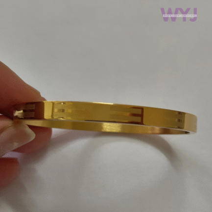 Minimalist Geometric Engraved Gold-Tone Bangle