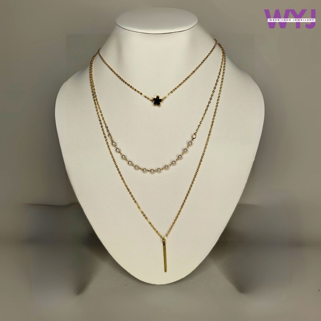 www.wearyourjewellery.com layered necklace for women , triple layered necklace , clover charm necklace , pearl station necklace , bar pendant necklace , gold tone layered chain , everyday necklace stack , gift for her jewelry , minimal layered necklace , office to party necklace